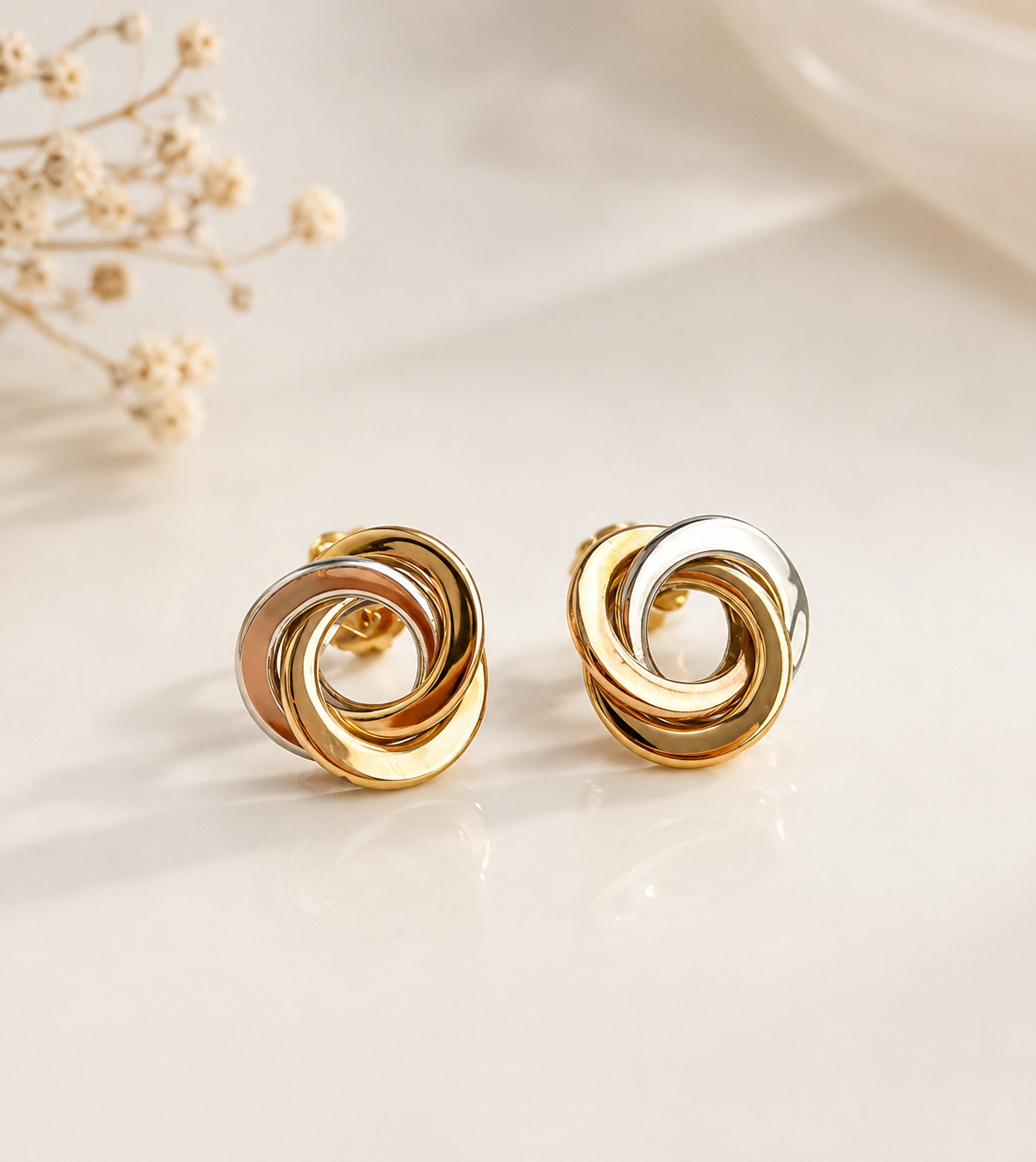 Interlock Stud Gold Earrings